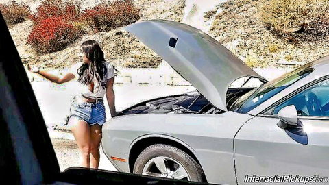 Latina star Violet Love in crop top and shorts by roadside car