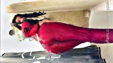 Wet Pakistani babe in tight shiny red dress clinging to petite ass and small tits in steamy bathroom