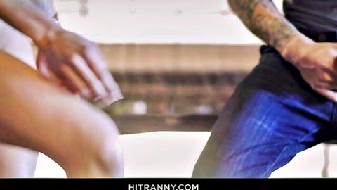 Ebony trans babe grabs tattooed guy's bulging cock through jeans as he gropes her thick thighs