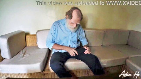 Bearded grandpa in blue shirt touches crotch bulge, from AshiaHo and MaikaMann oral scene