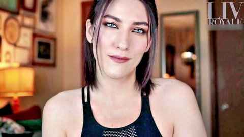 Liv Royale seductive gaze in black sports top, POV femdom tease