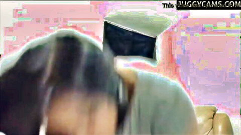 Busty cam girl with long dark hair teases in solo kinky action