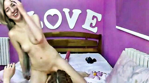 Two nude women tribbing shaved pussies, big tits and tight butts