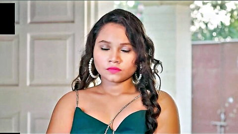 Seductive Indian woman in green dress, curly hair, teasing gaze for steamy lesbian action