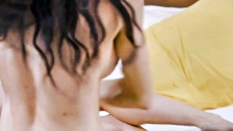 Sexy babe's tight ass and bare back in yellow thong arched on bed