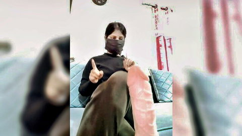 Kritika Hotty Indian model in teasing pose with pink dildo, black top and mask