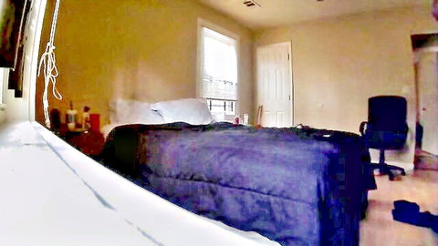 Empty amateur homemade bedroom with purple bed black chair ready for rough sex