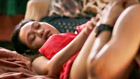 Sultry Asian Filipina lies asleep with legs spread wide in tight red dress teasing thighs