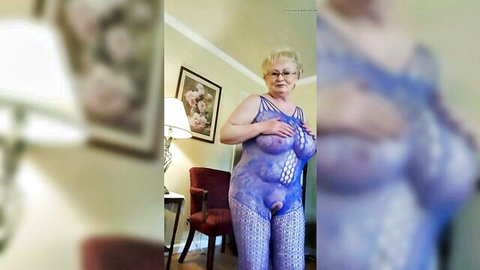 Blonde granny GILF posing seductively in sheer purple lingerie