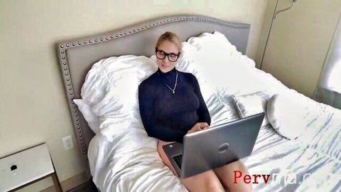 Blonde MILF Sarah Vandella in tight turtleneck and mini skirt on bed