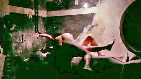 Naked mature woman with medium tits fucked missionary by man on dim rocky bed