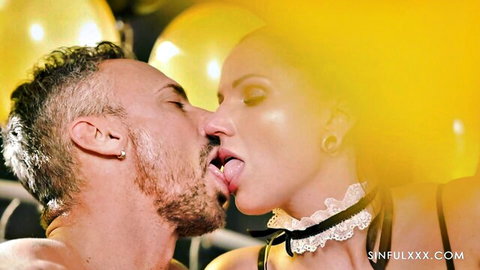 Hot blonde maid in lace choker passionately kissing bearded man