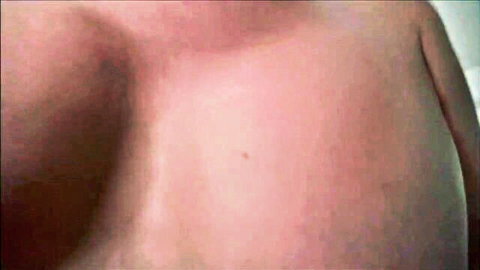 Busty mature woman topless, flushed skin after hot creampie sex lesson