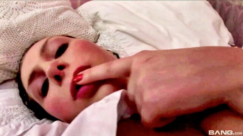 Claudia Rossi seductively licking fingers in POV close-up