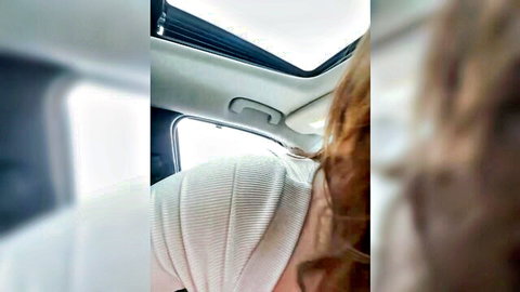 Blonde in white top inside car, teasing side profile for kinky anal play