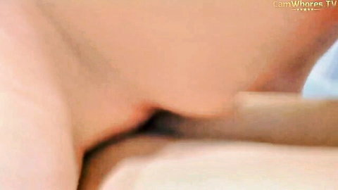 Close-up of Kyrgyz woman's exposed pussy being fingered on cam