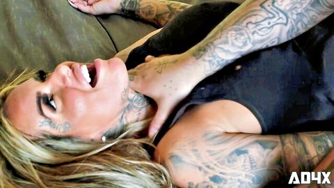 Tattooed blonde MILF Pamela Kayne in intense oral sex scene