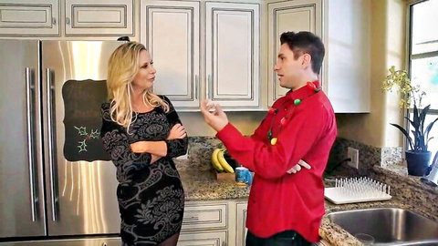 Blonde MILF in black dress chats with Santa guy in kitchen before Christmas hardcore sex