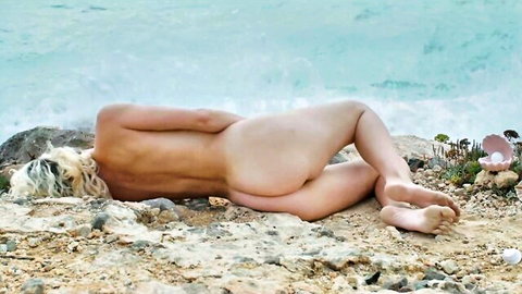Mar Nantas nude on rocky beach, blonde Spanish actress ass view