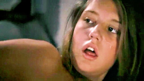 Freckled teen girl with open mouth and teary eyes in steamy ecstasy closeup