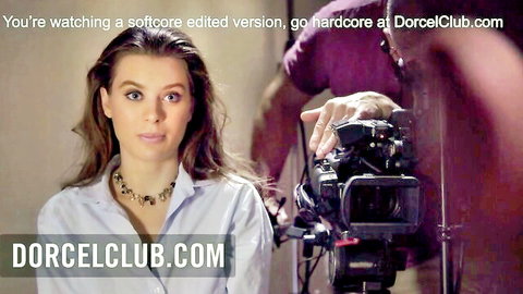 Blonde pornstar Lana in white blouse during softcore scene setup