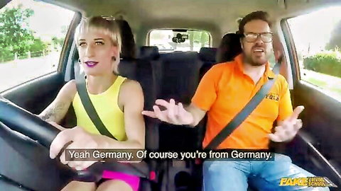 Blonde MILF with tattoos chats confidently with driver in car