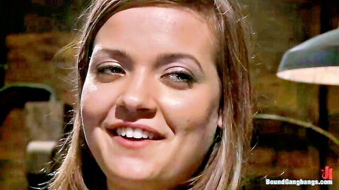Smiling brunette beauty from BoundGangbangs ready for rough gangbang fuck