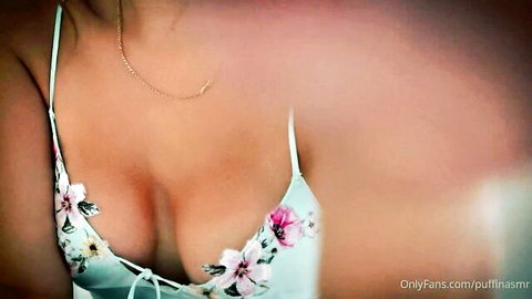 Sexy hot chick in floral lingerie showing deep cleavage, ASMR roleplay tease