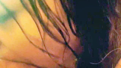Closeup of woman's open mouth dripping with thick sticky cum after blowjob