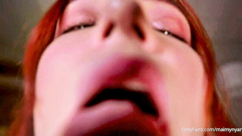 Redhead babe gaping her wet mouth wide with tongue out in ecstasy closeup