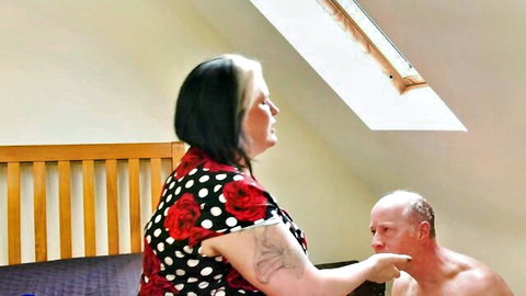 Mature woman in polka dot dress dominates bald man in amateur foot fetish preview
