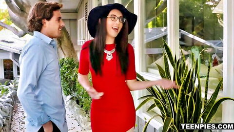 Cute glasses-wearing teen babe in tight red dress smiles with guy on porch before creampie fuck