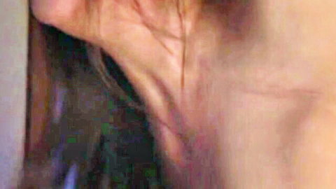 Mature Japanese woman's tense neck with bulging veins in ecstasy closeup