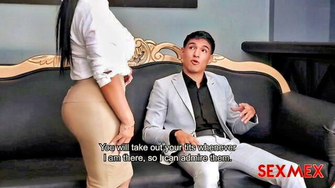 Big ass Latina MILF in tight skirt and blouse teases suited man on couch with her curves