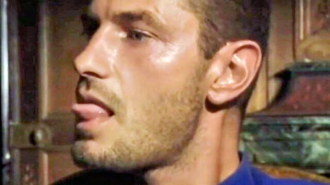 Vintage bearded stud in blue shirt sticks tongue out teasingly ready to lick pussy in retro porn scene