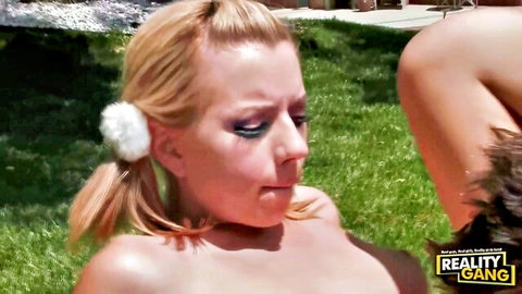 Lexi Belle as petite blonde cheerleader, topless tease outdoors on grass
