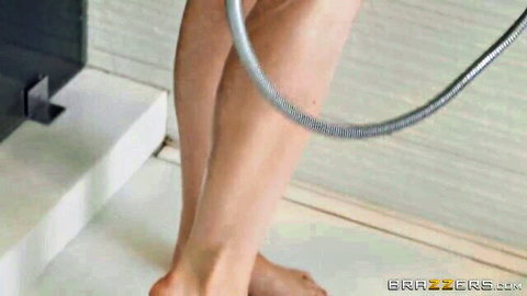 Kinky brunette MILF in shower with hose, teasing for DP threesome