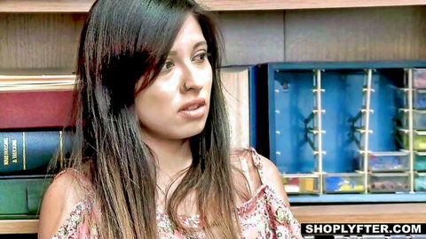 Naughty Indian teen with long dark hair looks concerned in ShopLyfter store punishment scene