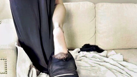 Jade dominates foot slave by gagging him with her bare feet on couch