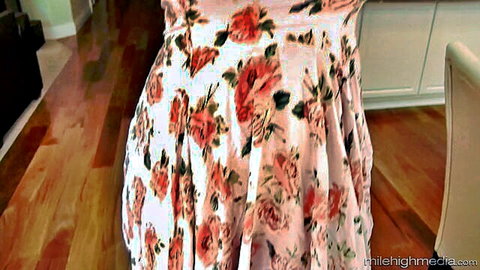 Brunette with big ass bends over kitchen counter in short pink floral dress teasing upskirt view