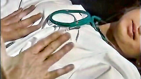 Gina Wild as nurse in medical exam scene, hands on chest