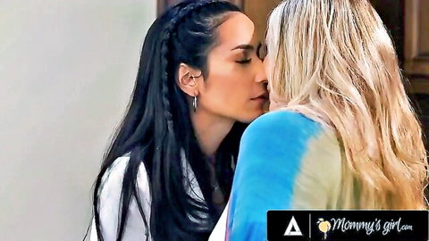 Passionate lesbian kiss between tanned brunette MILF and blonde beauty in Mommy's Girl scene