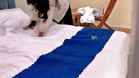 Sexy South Asian maid bends over bed teasing big ass in tight black pants
