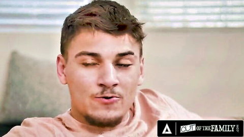 Close-up of handsome young stepbrother with mustache and intense gaze from taboo Out of Family series