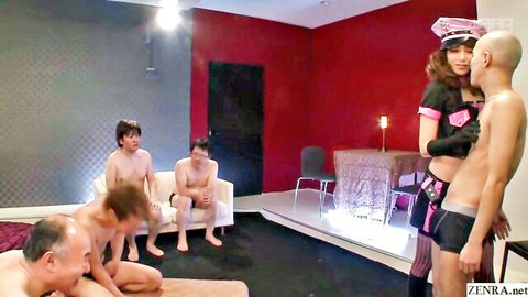 Asian police mistress in fishnets dominates group of naked submissive male slaves in CFNM femdom BDSM roleplay