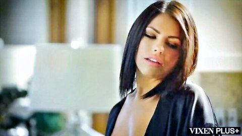 Adriana Chechik teases in open black robe, showing cleavage in Vixen Plus interracial threesome