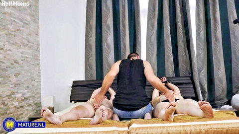 Mature submissive women pleasured by man in intense threesome