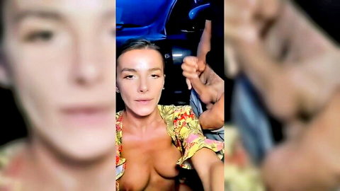 Naughty brunette with massive cleavage in floral top teases in car with man's hand on her tits