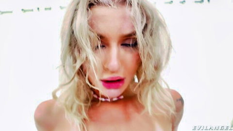 Blonde with wet hair, seductive close-up in adult video thumbnail