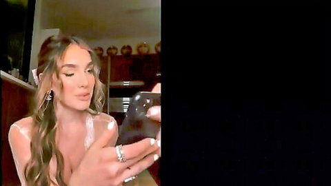 Lyna Perez nude selfie in sheer top, showing big tits and curvy body